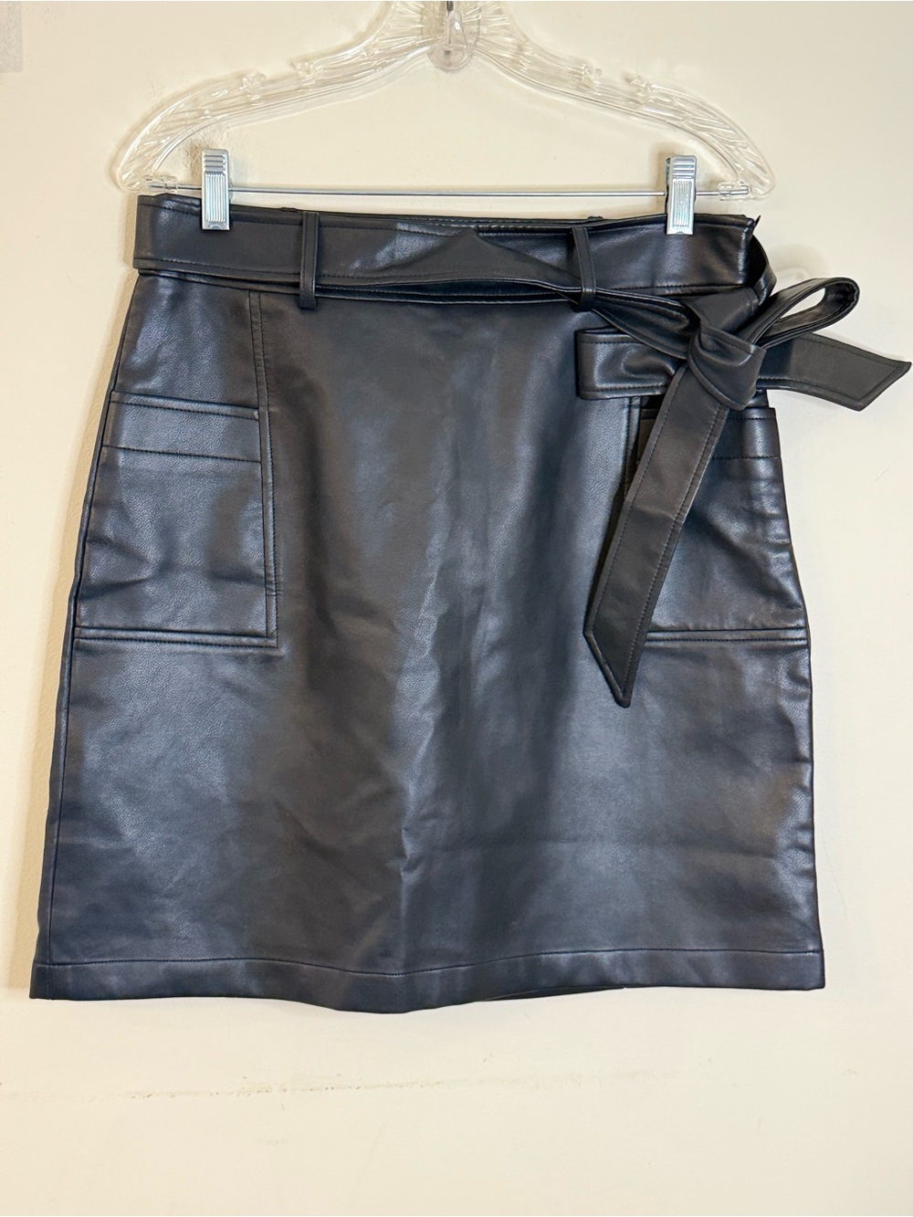 Bagatelle black faux leather mini skirt pockets & bow SZ M